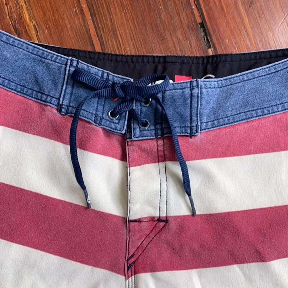 Quiksilver red white and blue striped unlined board shorts sz 28